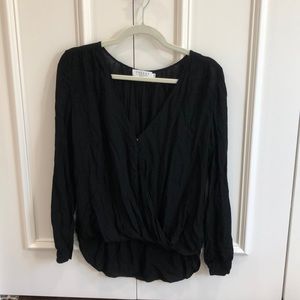 Small long sleeve black top. Thin and breezy material. Trendy. Brand is Velvet.